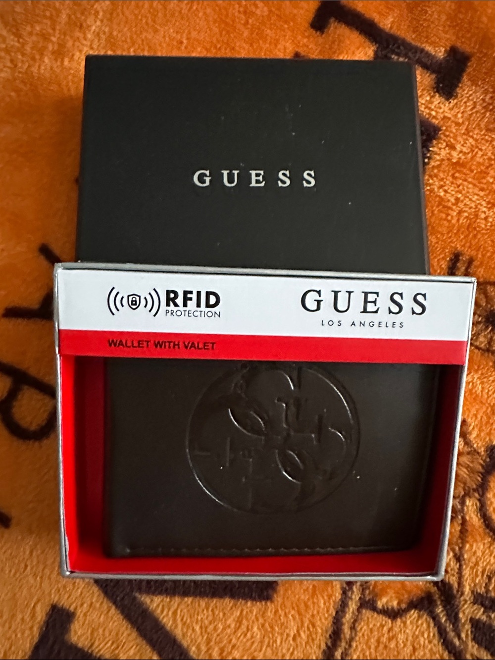 Guess Men's Bi-Fold Wallet in Dark Brown with Embossed Logo